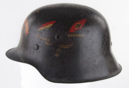 'FIGHTING 69TH' CAPTURED AND DECORATED GERMAN HELMET