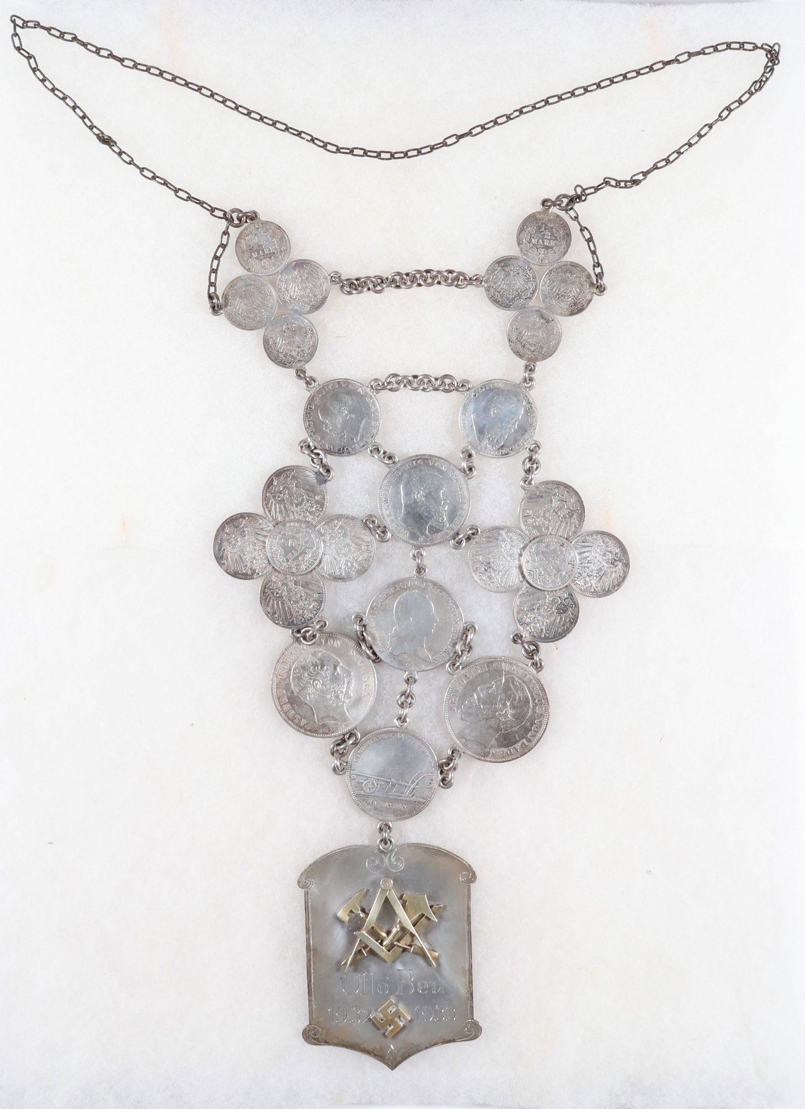1933 GERMAN MASONIC NECKLACE: Impressive 1933 German Masonic necklace, a rather elaborate creation consisting of a 2.75 x 3.25 in. hallmarked sterling plaque with brass Masonic symbols affixed to it, including a compass, trowels, 