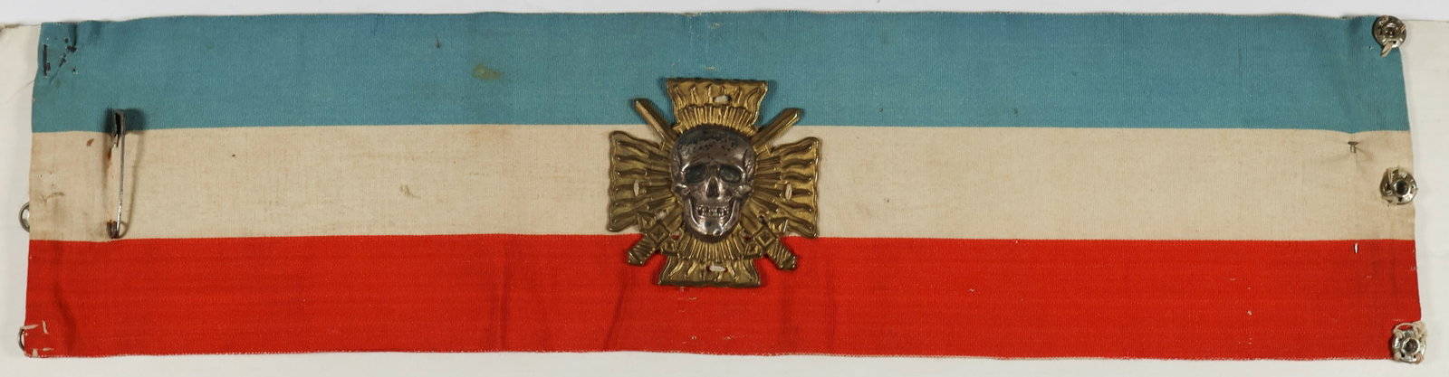 ORIGINAL ARMBAND OF THE FRENCH RIGHT-WING GROUP, CROIX-DE-FEU: An interesting military relic of the interwar right-wing league, Croix-de-Feu, which was founded by General Francois de la Rocque and existed from 1930-1936. This armband measures 13.5 x 3.5 in., comp