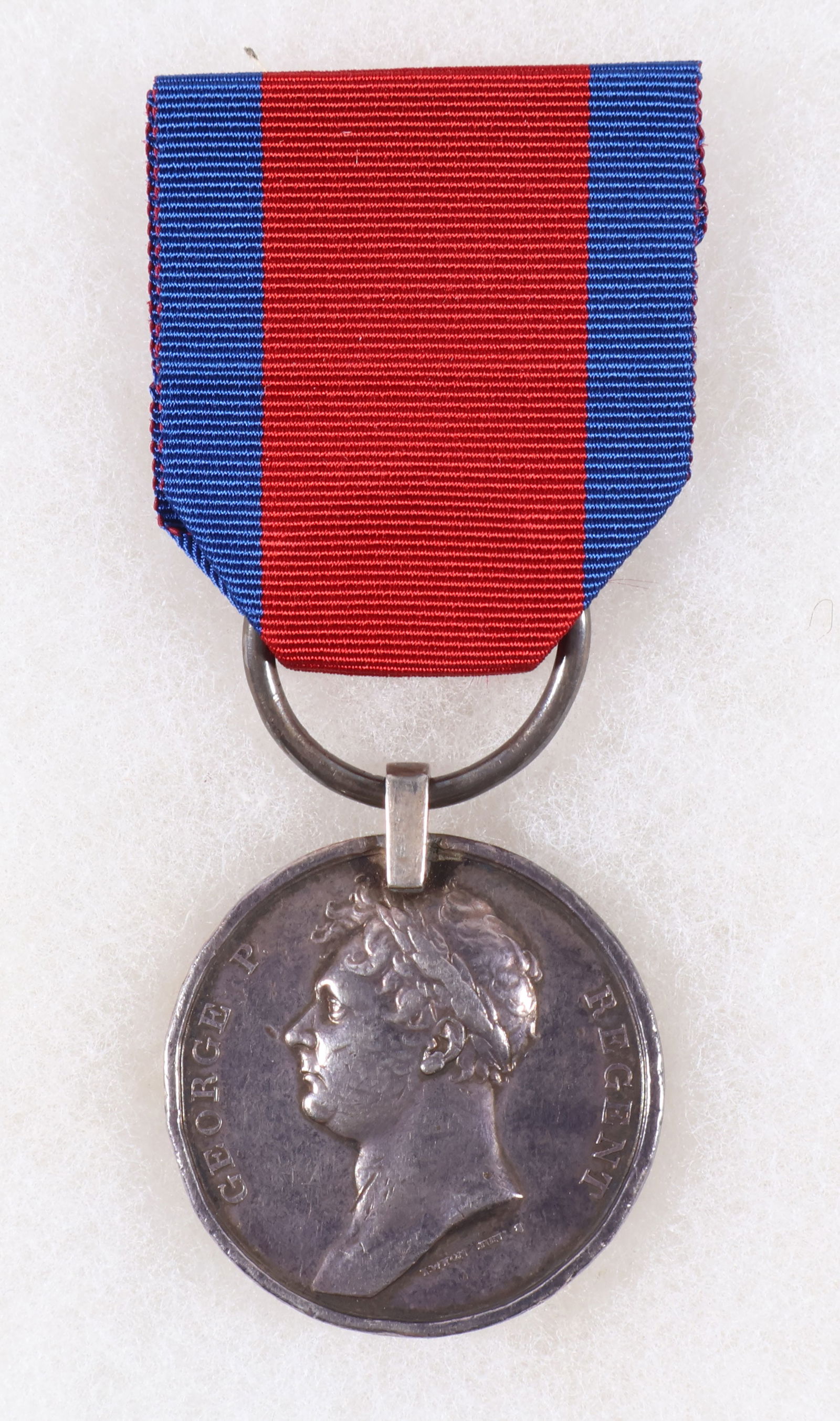 WATERLOO MEDAL ISSUED TO JOHN THORNTON, 2ND BN., 30TH RGT. FOOT: Silver Waterloo Medal with (replacement) ribbon, issued to Battle of Waterloo veteran John Thornton of the 2nd Battalion, 30th Regiment of Foot and whose name is engraved about the rim of the medal. T