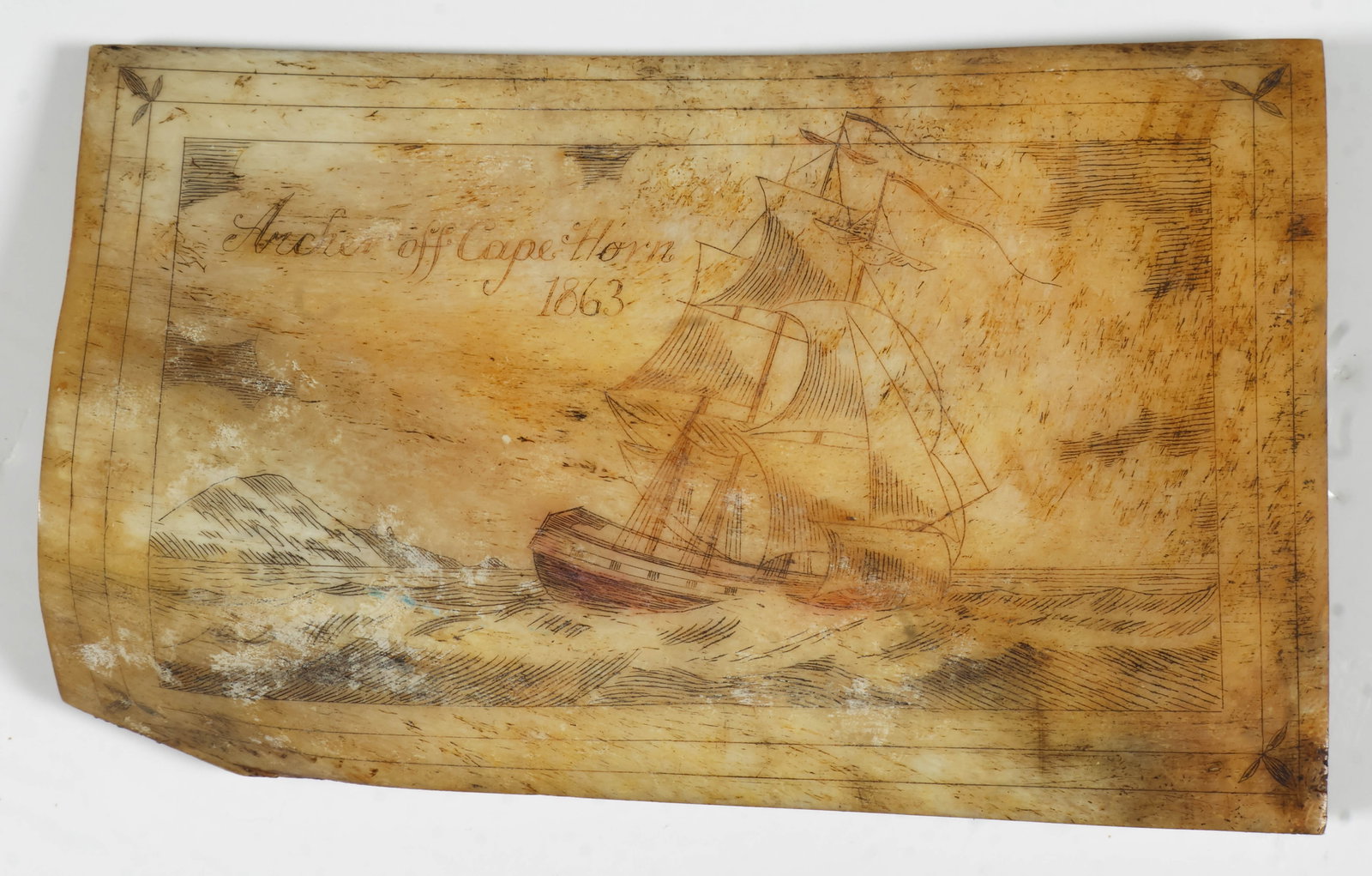 SCRIMSHAW OF THE 'ARCHER' OFF CAPE HORN: A nice piece of scrimshaw, likely on a whale rib section, 5 1/8 x 3 1/4 in., depicts a brig in heavy seas, entitled: 'Archer off Cape Horn 1863'. Very good. There is a record of a whaling vessel 'Arch