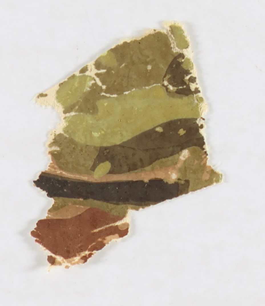 ABRAHAM LINCOLN PETERSEN HOUSE WALLPAPER RELIC: A rare Lincoln assassination relic, a small swath of original wallpaper from the room in the Petersen House where Lincoln died. The swath measures approx. .75 in. square, and was obtained by the origi