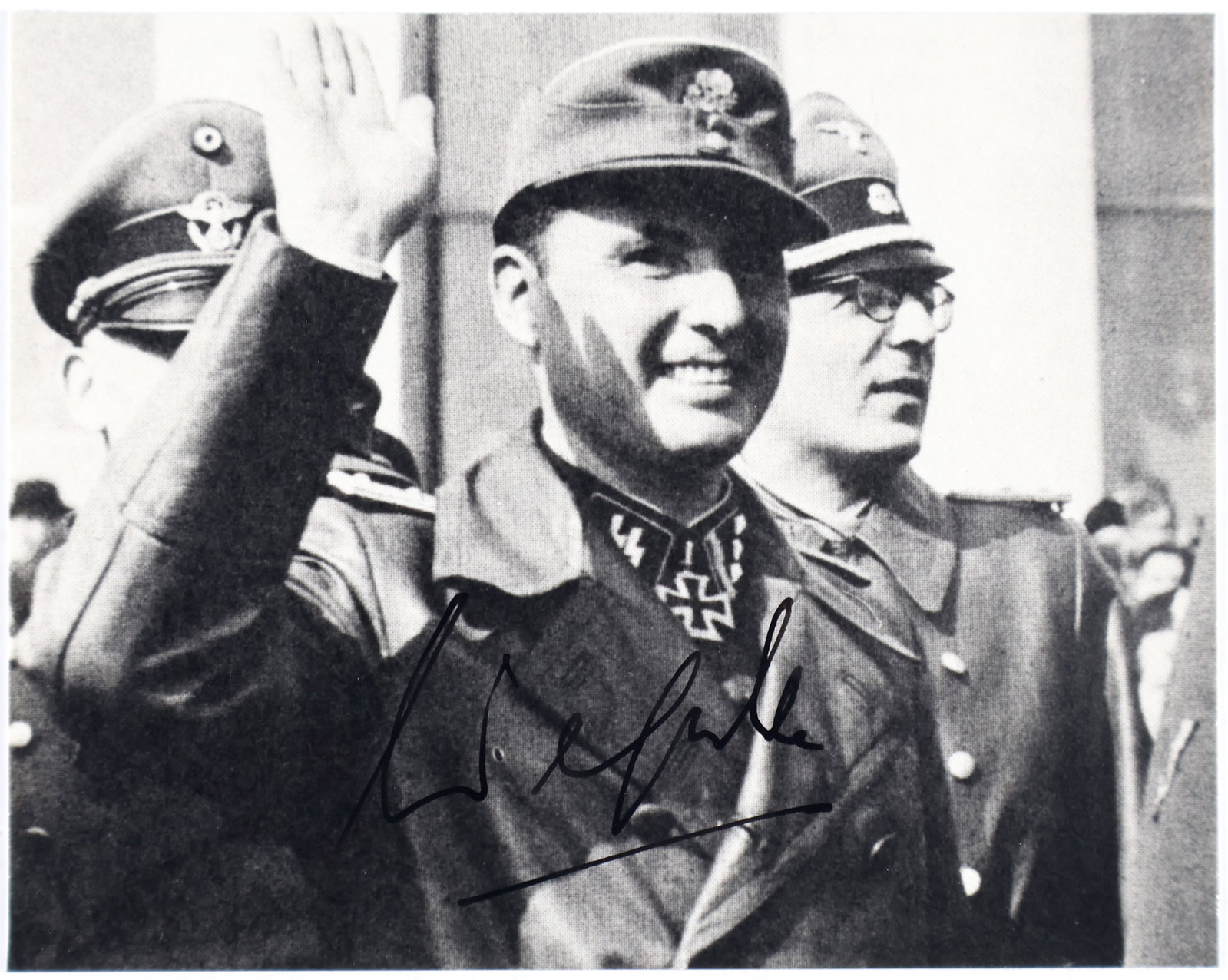 LEON DEGRELLE: (1906-1994) German soldier and close friend of Hitler, a Belgian volunteer in the German Army, he escaped to Spain at war's end. S.P. 5.25 x 4.5 in. b/w, a reprint of a vintage image, boldly signed in