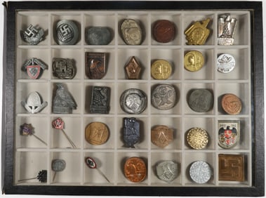 VARIOUS TINNIES AND BADGES (35)