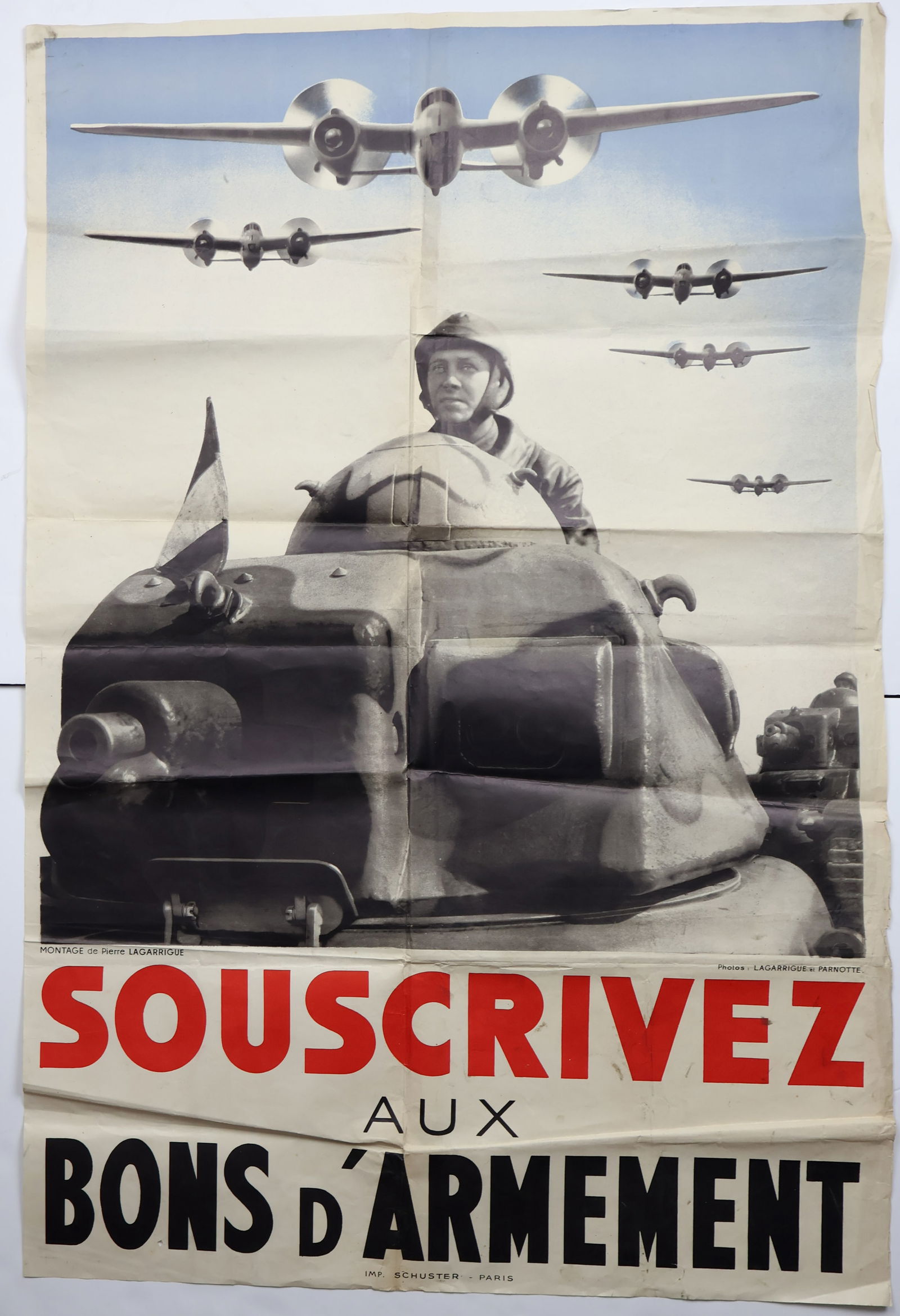 FRENCH WAR BOND POSTER: A superb example of a World War II poster from France, 31.5 x 47 in., depicting three tanks with a spotter above the main gun, driving beneath a squadron of three French bombers with the caption: R