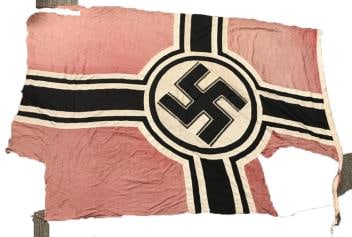 THE GERMAN REICHSKRIEG FLAG CAPTURED AT THE FALL OF ST. MALO, FRANCE