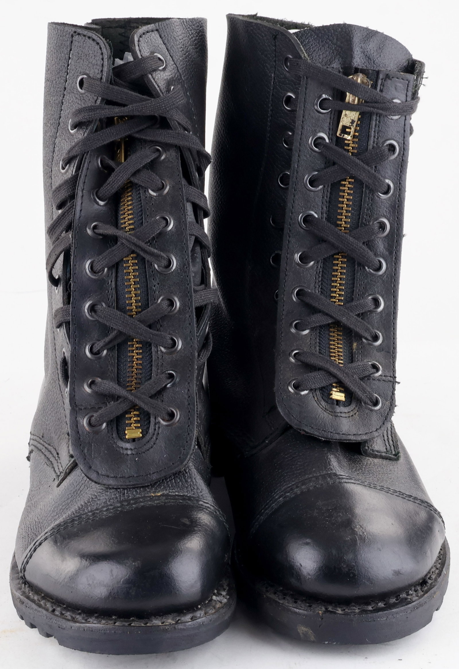 IRAQI REPUBLICAN GUARD BOOTS: Pair of black leather boots once belonging to a member of the Iraqi Republican Guard, the elite troops of the Iraqi army directly reporting to Saddam Hussein before the 2003 invasion of Iraq. Can be c