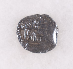 TWO REALE SILVER COIN FROM ATOCHA, WITH MEL FISHER CERTIFICATE