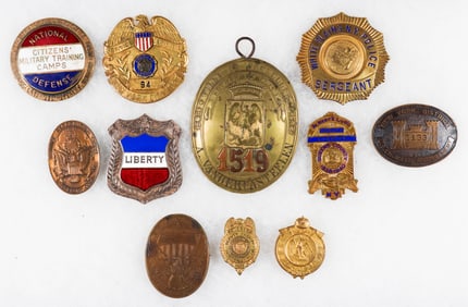 POLICE AND RELATED BADGES (11)
