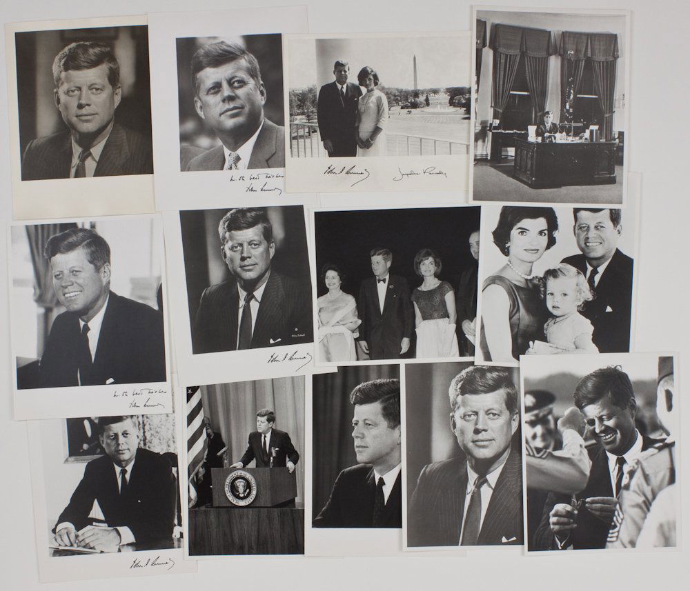 JOHN F. KENNEDY PHOTOGRAPHS: A great group of 13 vintage photos from the Kennedy White House, 8" x 10" b/w, many published images of JFK in formal poses, at the podium, with Jackie and the Johnsons, with his family, and so forth.