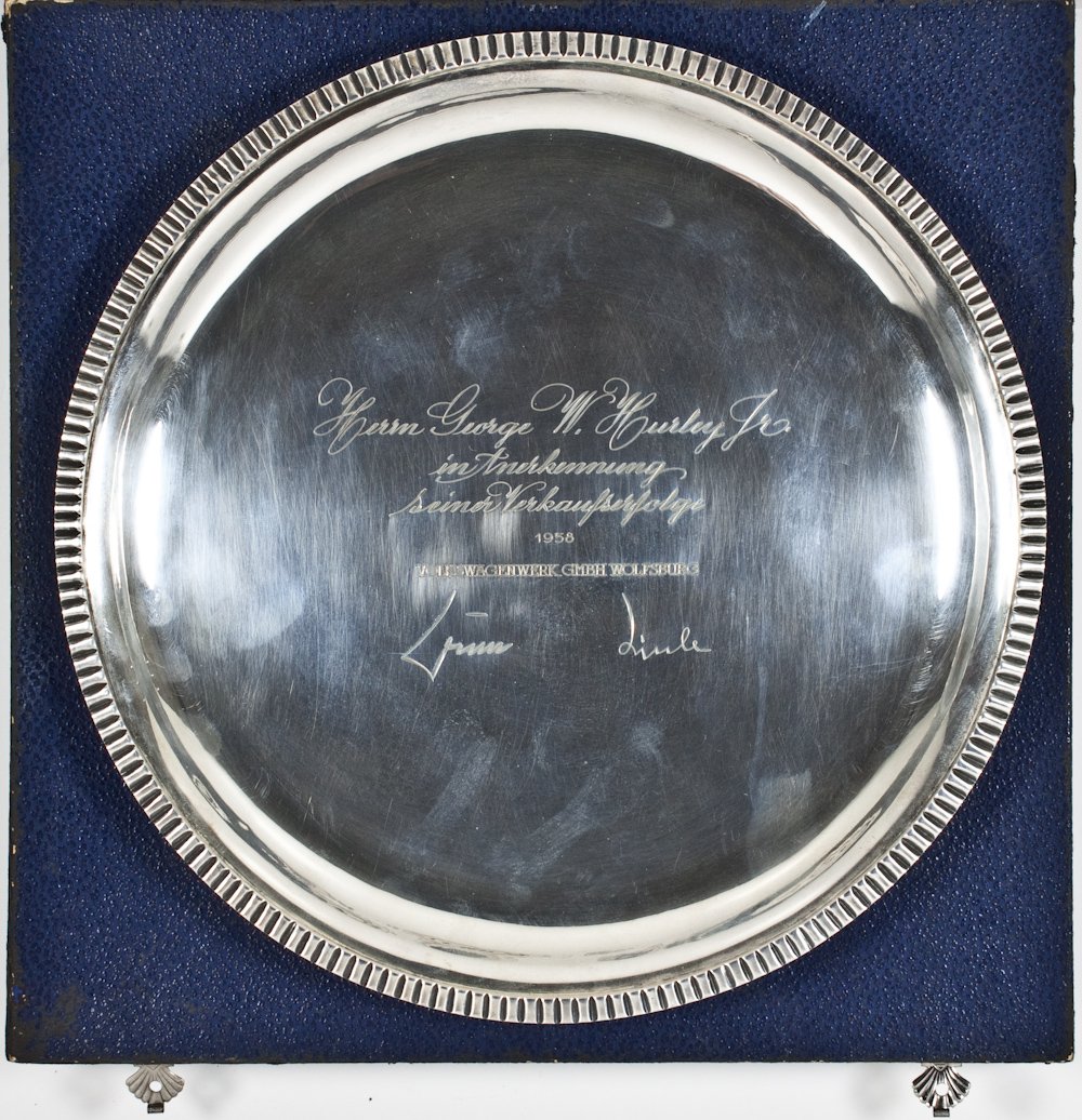 1958 VOLKSWAGEN SALE AWARD: Early Volkswagen sale award, a sterling silver tray with fluted edges, 10 1/2" dia., presented by "Volkswagenwerk GMBH" in Wolfsburg, 1958, presented to American dealer George W. Hurley, Jr. with insc