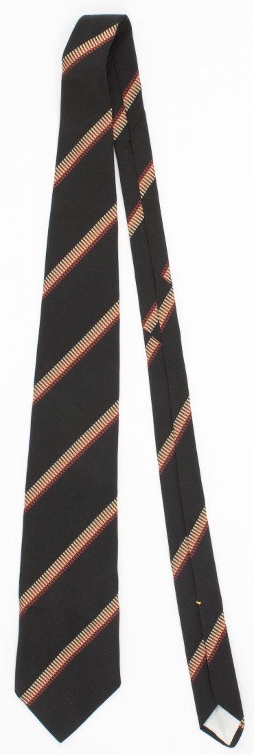 MICKEY COHEN'S BROWN STRIPED NECKTIE: MICKEY COHEN (1913 - 1976) American gangster who started his career as Bugsy Siegel's bodyguard, but said to have been absent at Siegel's death on orders from Meyer Lansky. Cohen later fought for cont