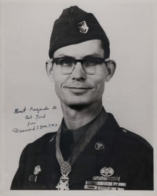 DESMOND T. DOSS