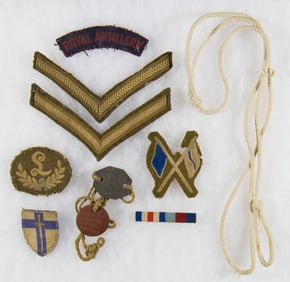 BRITISH ARMY ARTILLERYMAN INSIGNIA AND DOCUMENT GROUPING