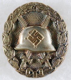 EARLY WOUND BADGE IN GOLD