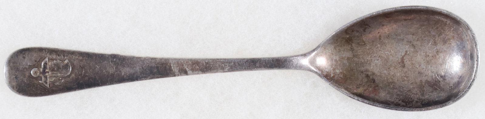 NSDAP HAUS DER DEUTSCHEN KUNST SILVER SPOON: Very rare NSDAP Haus Der Deutschen Kunst, Munich silver-plated spoon, 5.5 in. long. The spoon handle bears the emblem of the institution, the underside marked by maker Bruckmann adding a purity stamp 
