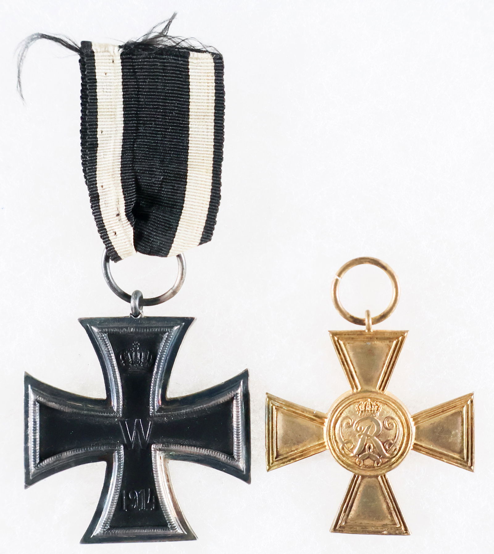 IRON CROSS, 2ND CLASS AND PRUSSIAN MILITARY MERIT MEDAL: Pair of World War I medals, includes: Iron Cross, 2nd Class with ribbon, marked 'KO' (Koniglische Munzamt Stuttgart) on the suspension ring, very good to fine, and a Prussian Military Merit Medal, lac