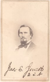 JAMES E. JOUETT