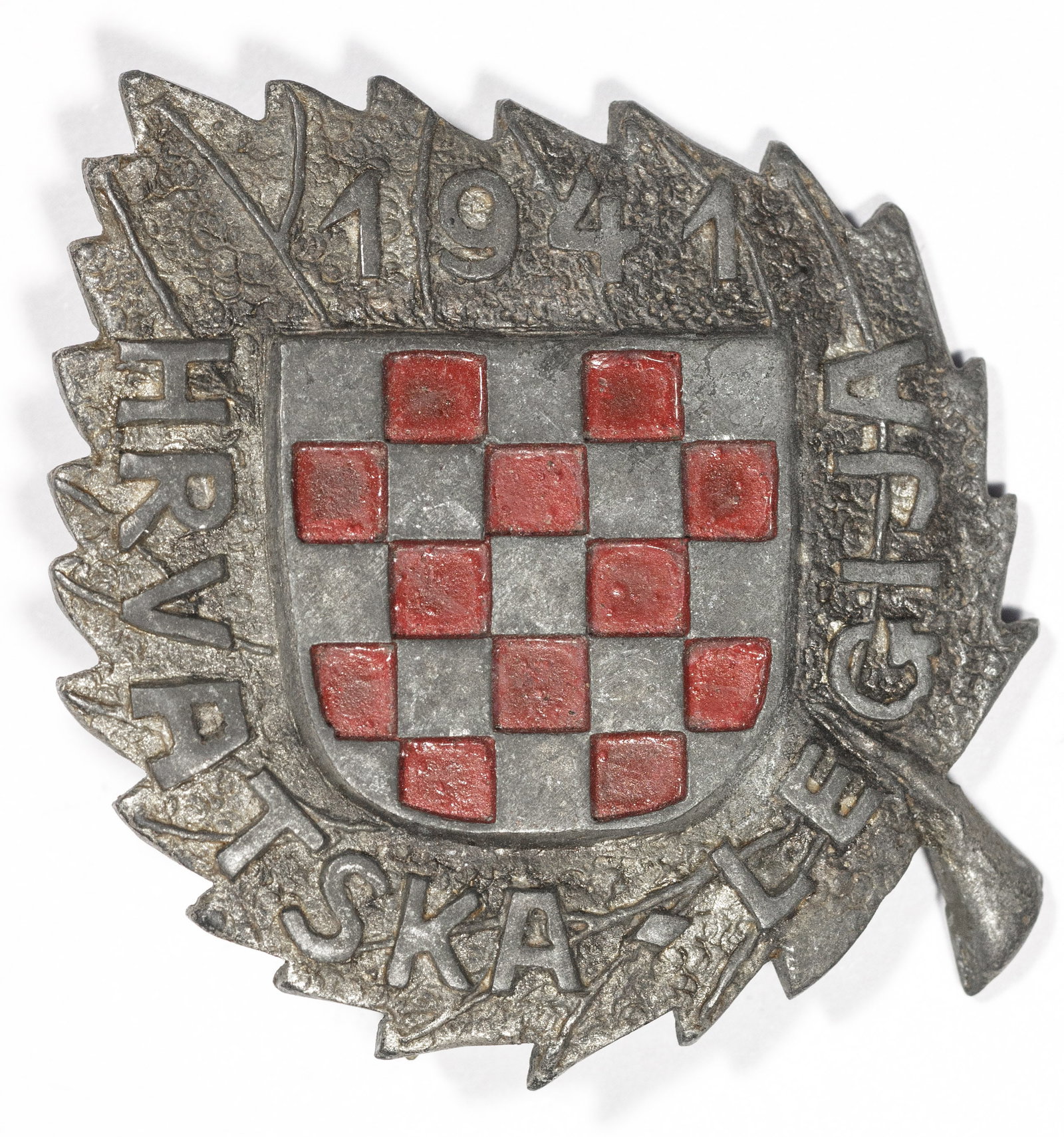 EARLY WEHRMACHT CROATIAN LEGION COMMEMORATIVE BADGE: Scarce World War II commemorative badge, approx. 1.5 in. square, worn by members of the 369th Reinforced Infantry Regiment of the Wehrmacht, commonly known as the Croatian Legion. The badge is, unusua