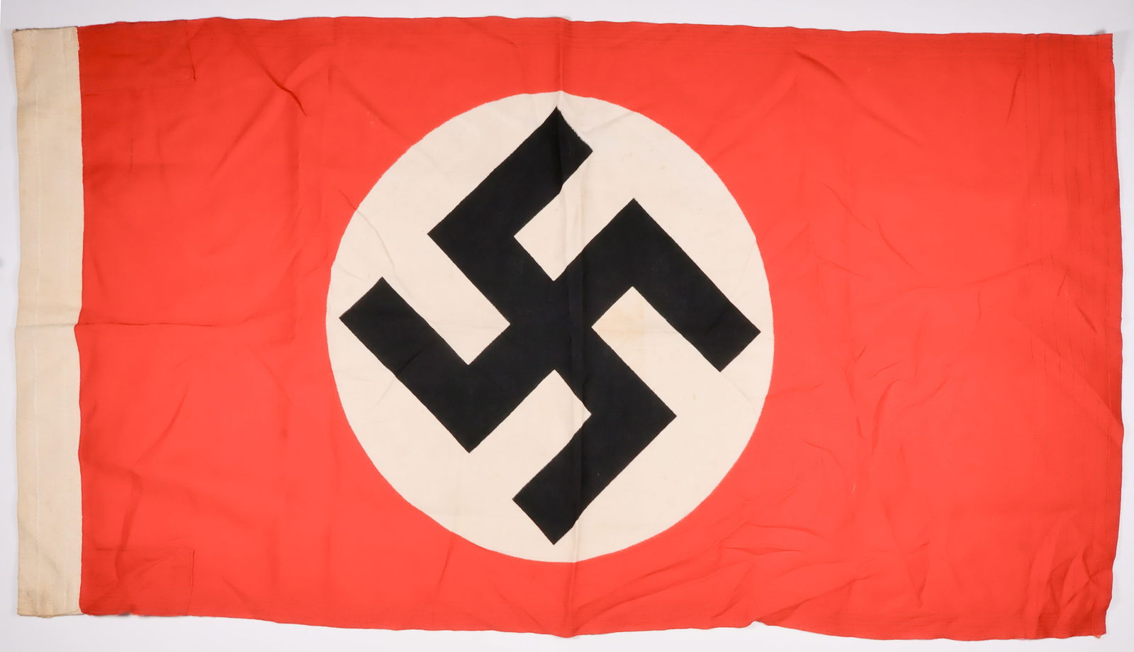 N.S.D.A.P. GOSCH HARBOR FLAG: Rare NSDAP Gosch harbor flag in the most desirable size, 50 x 85cm (18 x 32 in.). These flags were used on U-boats, E-boats, and other small water craft while in harbor, and when Nazi dignitaries were