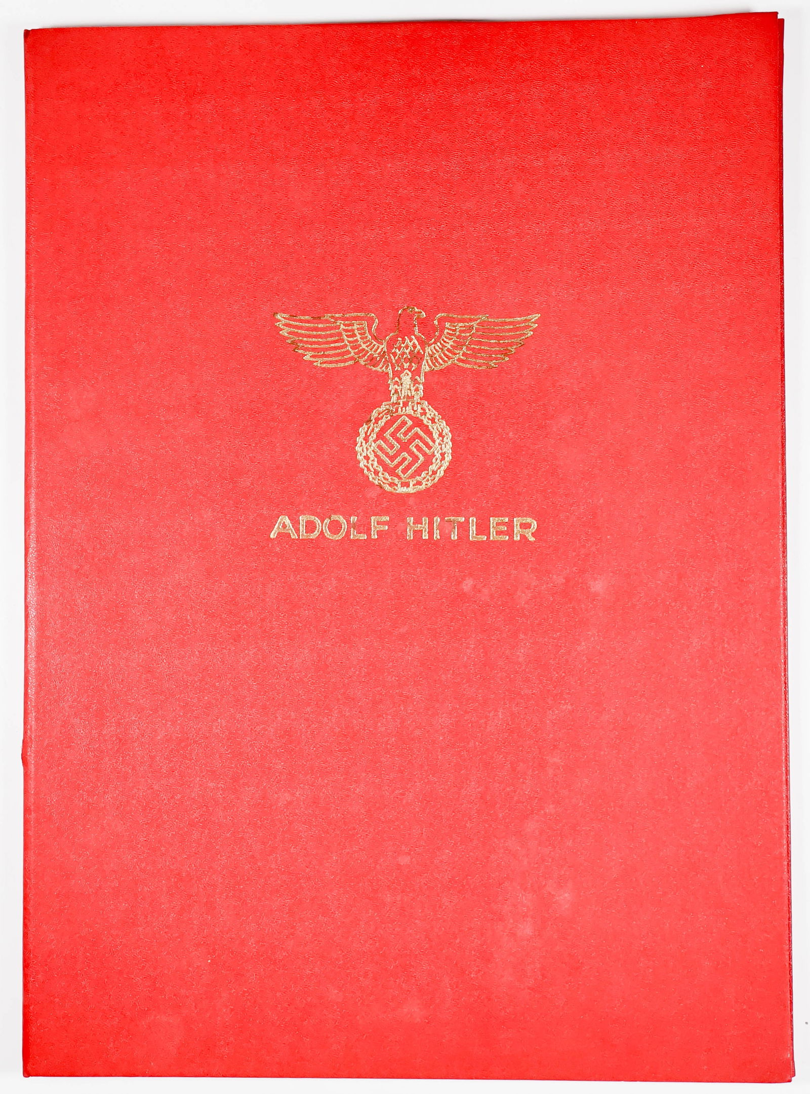 ADOLF HITLER'S POLITICAL AND PRIVATE TESTAMENTS: An earlier printing of Adolf Hitler's political and private testaments in a presentation red leather folder, 6pp. 10.75 x 14.75 in. on parchment-like paper, ca. late 1940s-early 1950s. The complete te