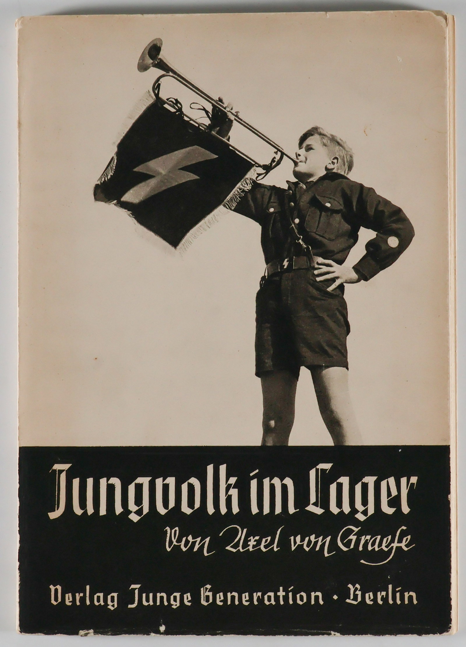'HITLER YOUTH IN CAMP': Book: ‘Jungvolk im Lager' (‘Young People at Camp') (Young Generation: Berlin, n.y.). Unpaginated, 8vo, the preface a quote from a speech from Adolf Hitler on May 1, 1934. A heavily illustr