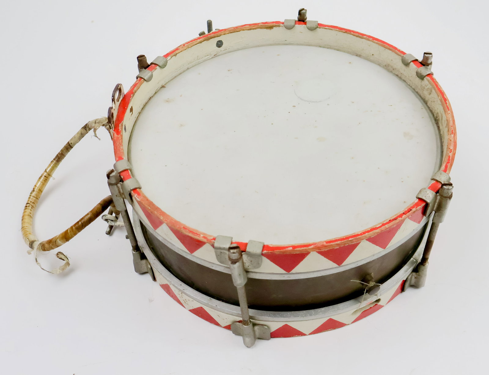 HITLER YOUTH SNARE DRUM: Hitler Youth snare drum with red and white painted wood trim, 12 in diameter, 5 in. tall, brass sides with all original hardware including support, with replacement drum heads in place of original ski