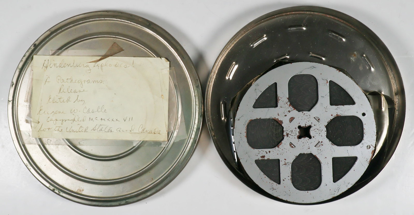 'HINDENBURG EXPLODES!' PATHE NEWS FILM: Period newsreel titled 'HINDENBURG EXPLODES!', 16mm. film on original 5 in. spool, 1937, unviewed by us but in apparently very good condition. In a film canister.