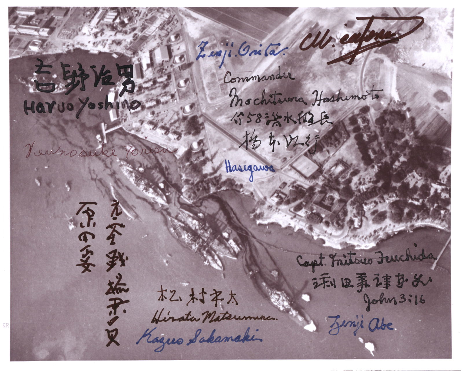 (PEARL HARBOR): A superb association piece, a 10 x 8 in. b/w. reprint of a war-date aerial view photograph of the attack on Pearl Harbor, signed by 11 Japanese military figures who were involved in the attack: