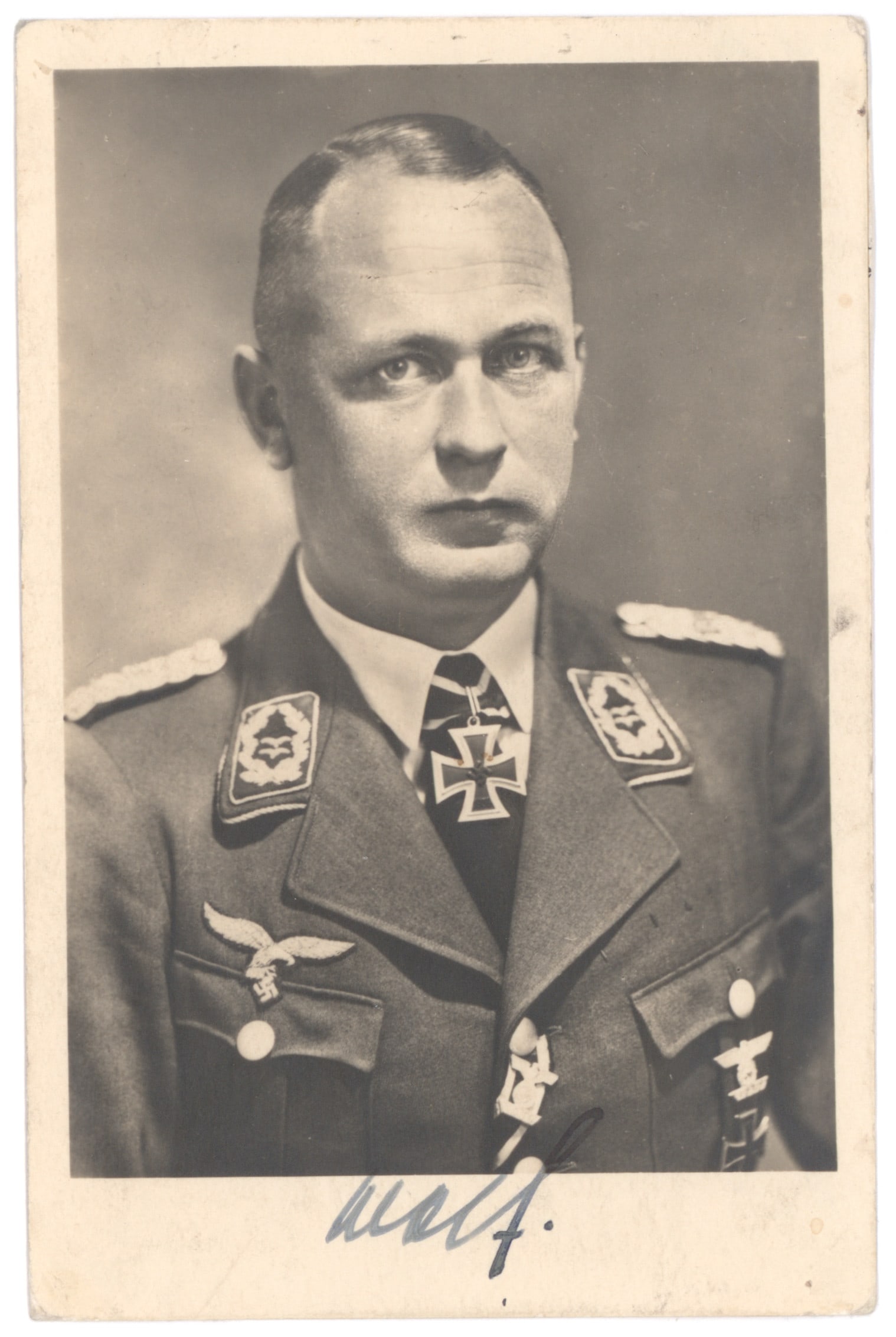 ADOLF WOLF: (1899 - 1973) German general in the Luftwaffe, commanded the 13. Flak Division. He was a recipient of the Knight's Cross of the Iron Cross. S.P., 3.5 x 5.5 in. b/w, a portrait in uniform displaying