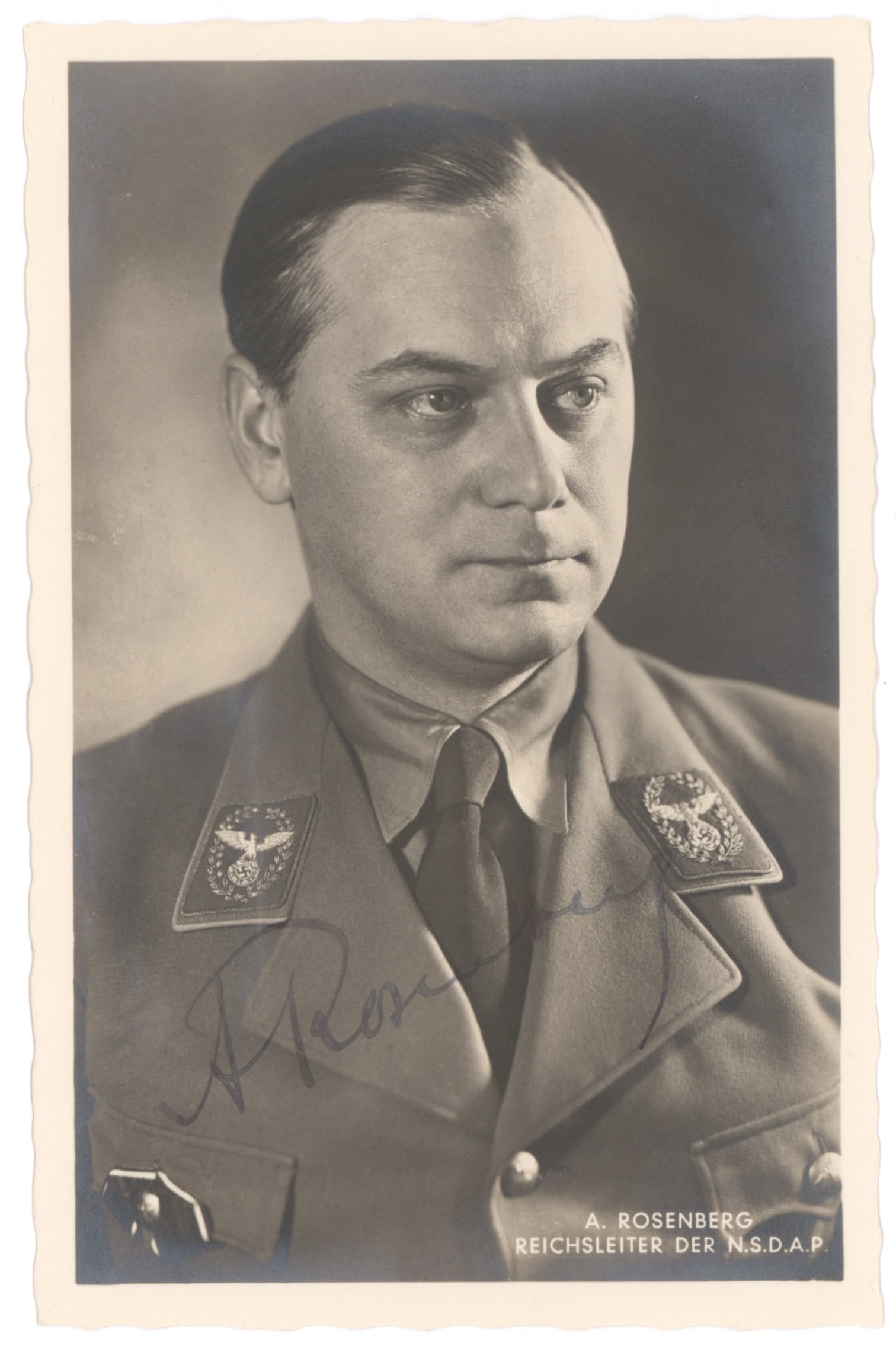 ALFRED ROSENBERG: (1893 - 1946) Nazi leader considered the ideologist of Nazism, Reichsminister of the eastern territories, executed at Nuremberg. S.P., 3.5 x 5.5 in. b/w, a Hoffmann real-photo postcard portrait in