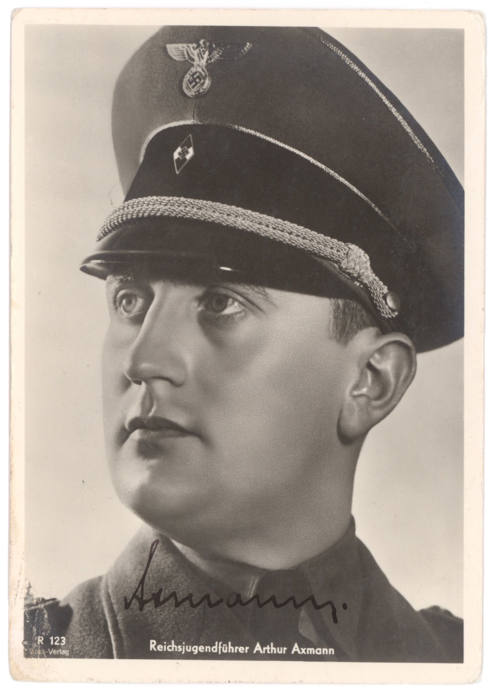 ARTUR AXMANN: (1913 - 1996) German Nazi national leader (Reichsjugendführer) of the Hitler Youth from 1940 to the war's end in 1945. S.P., 4 x 6 in. b/w, a bust portrait in uniform with Hitler Youth visor