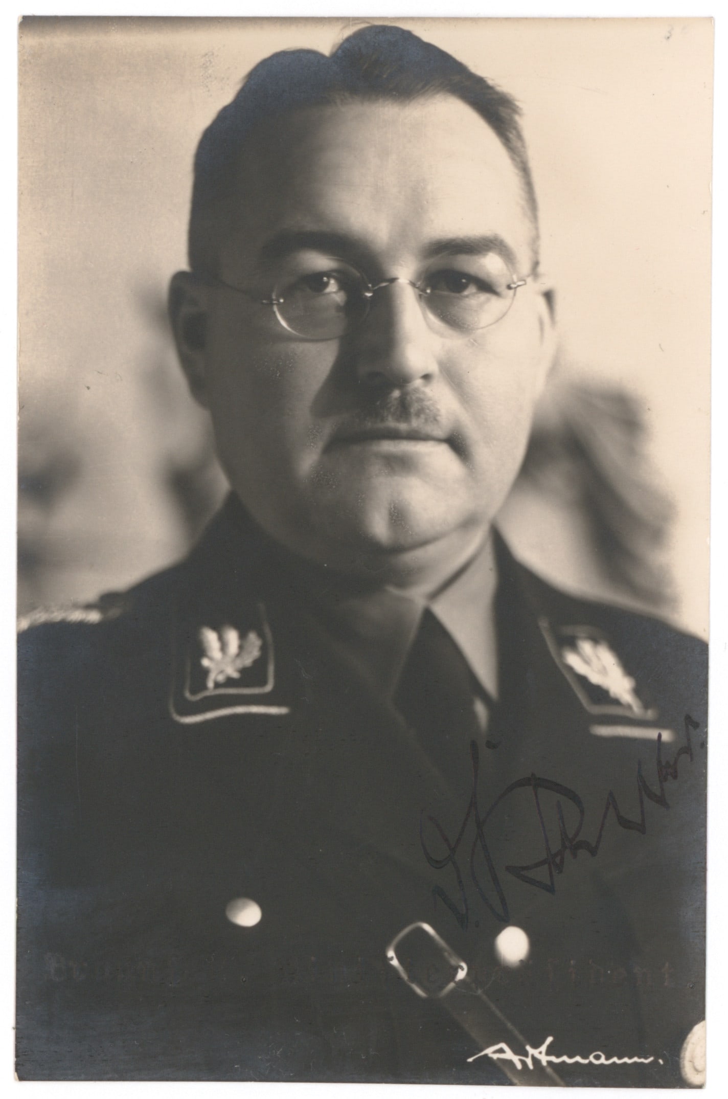 DIETRICH KLAGGES: (1891 - 1971) Prime Minister of the now abolished state of Braunschweig who gave Hitler German citizenship. Rare S.P., 3.5 X 5.25 in. b/w, a chest, up pose in his SS uniform hurriedly signed at bottom