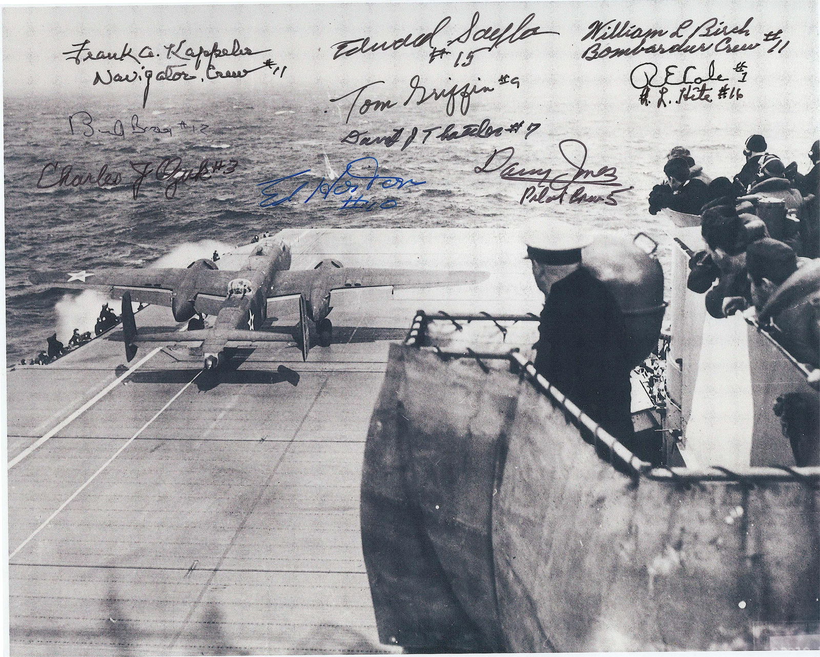 DOOLITTLE RAIDERS: A superb S.P. 10 x 8 in. b/w reproduction showing a plane preparing for flight in Jimmy Doolittle's carrier-launched bombing raid against Tokyo on April 18, 1942. Signed by 11 Raiders, with all