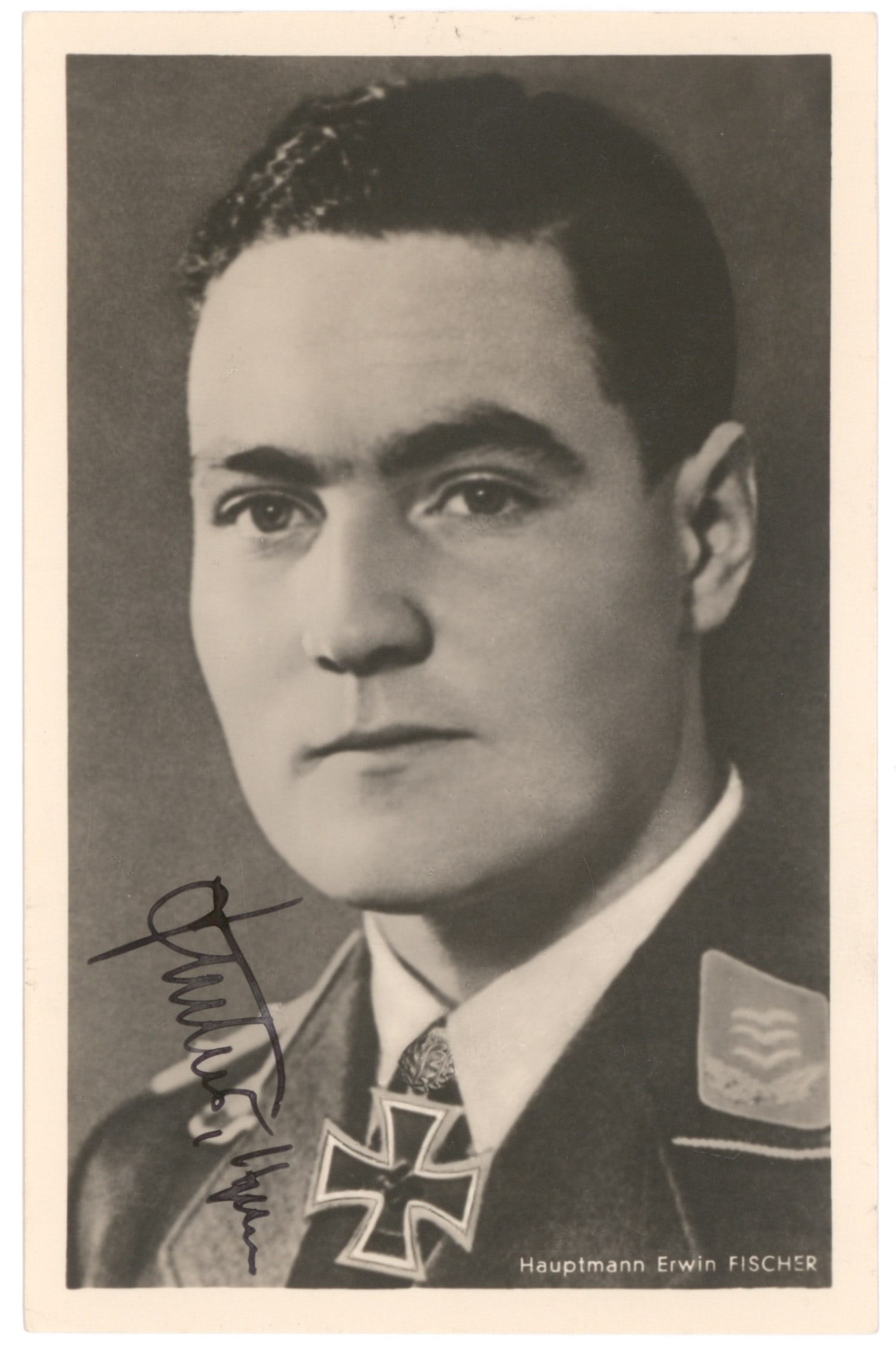 ERWIN FISCHER: (1912-1996) Luftwaffe pilot and recipient of the Knight's Cross with Oak Leaves participated in the campaigns in Britain, France, North Africa, and Malta. S.P., 3.75 x 5.5 in., b/w, a Hoffman postcard