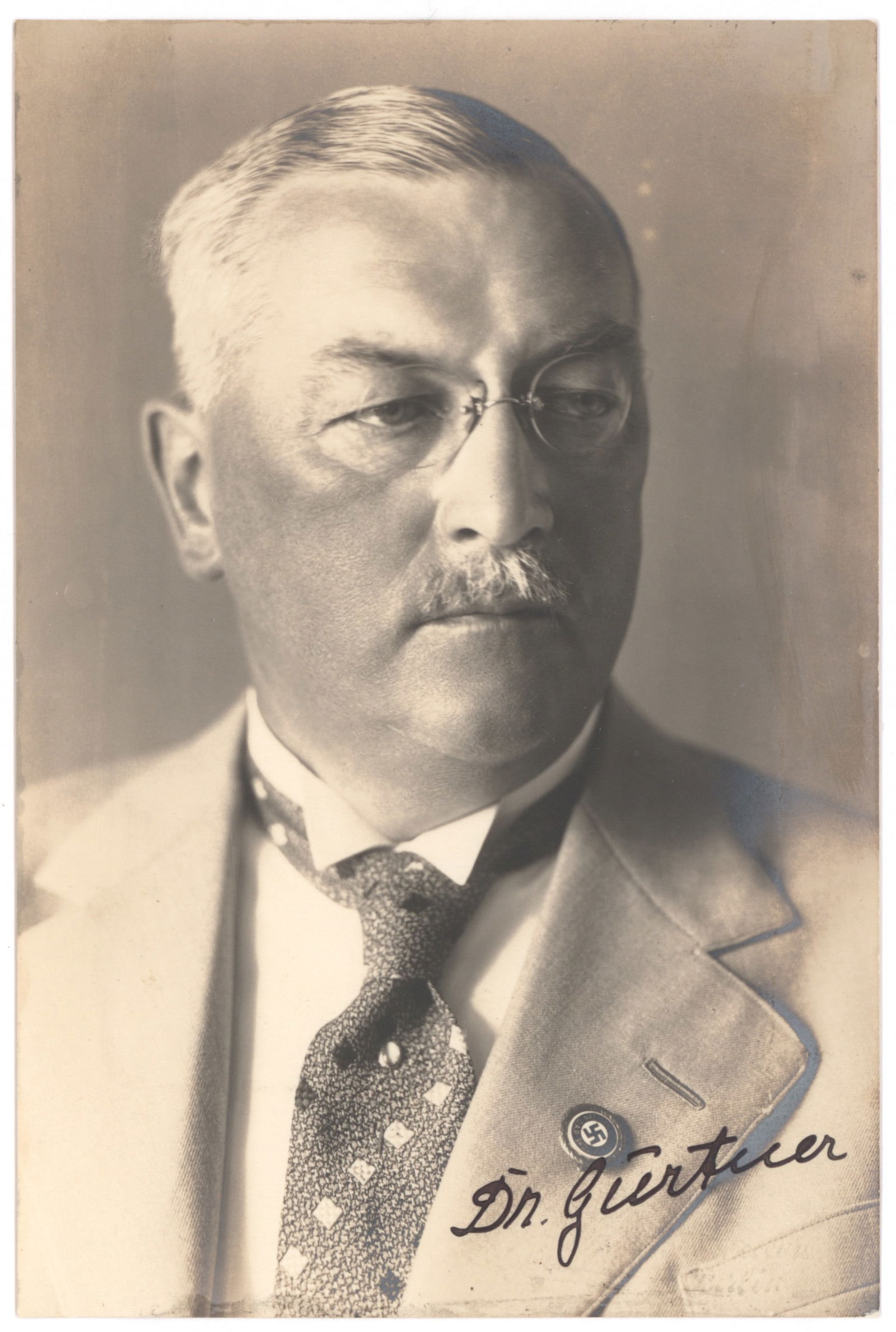 FRANZ GURTNER: (1881 - 1941) German Minister of Justice in Hitler's cabinet. Detesting the cruel ways of the Gestapo and SA in dealing with prisoners of war, he protested unsuccessfully to Hitler. Eventually found