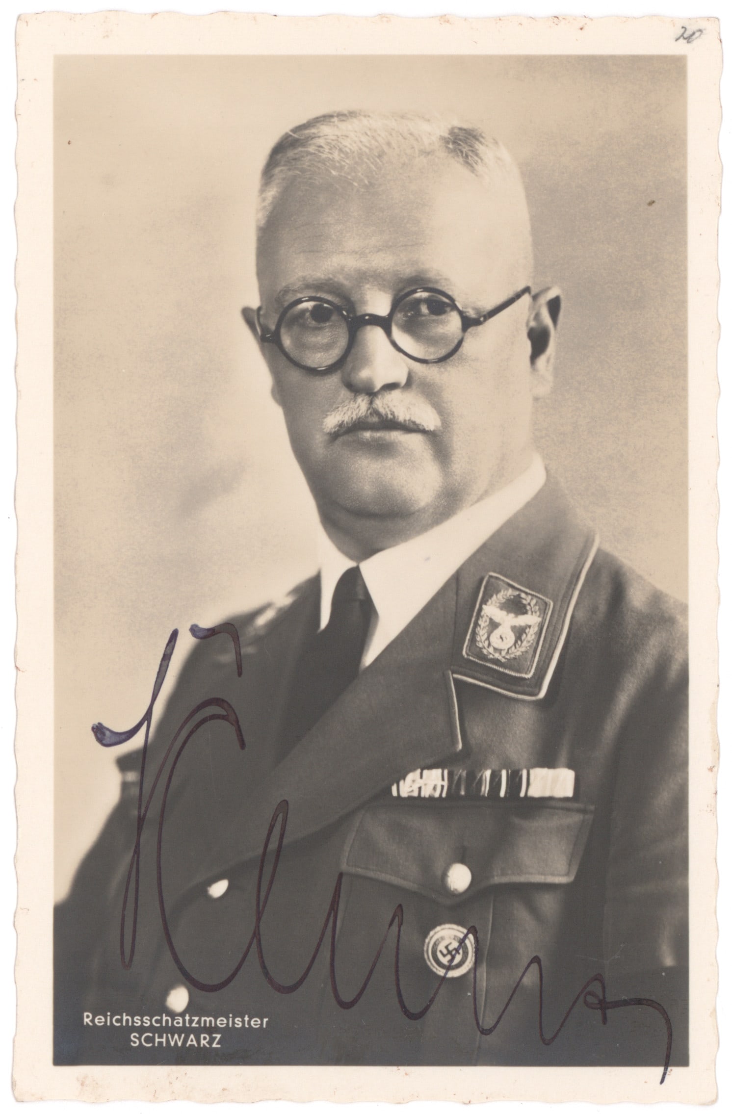 FRANZ XAVER SCHWARZ: (1875 - 1947) German politician who served as National Treasurer of the Nazi Party. S.P., 3.5 x 5.5 in. b/w by Hoffmann, a chest, up pose in uniform signed in black ink at bottom. Fine condition.
