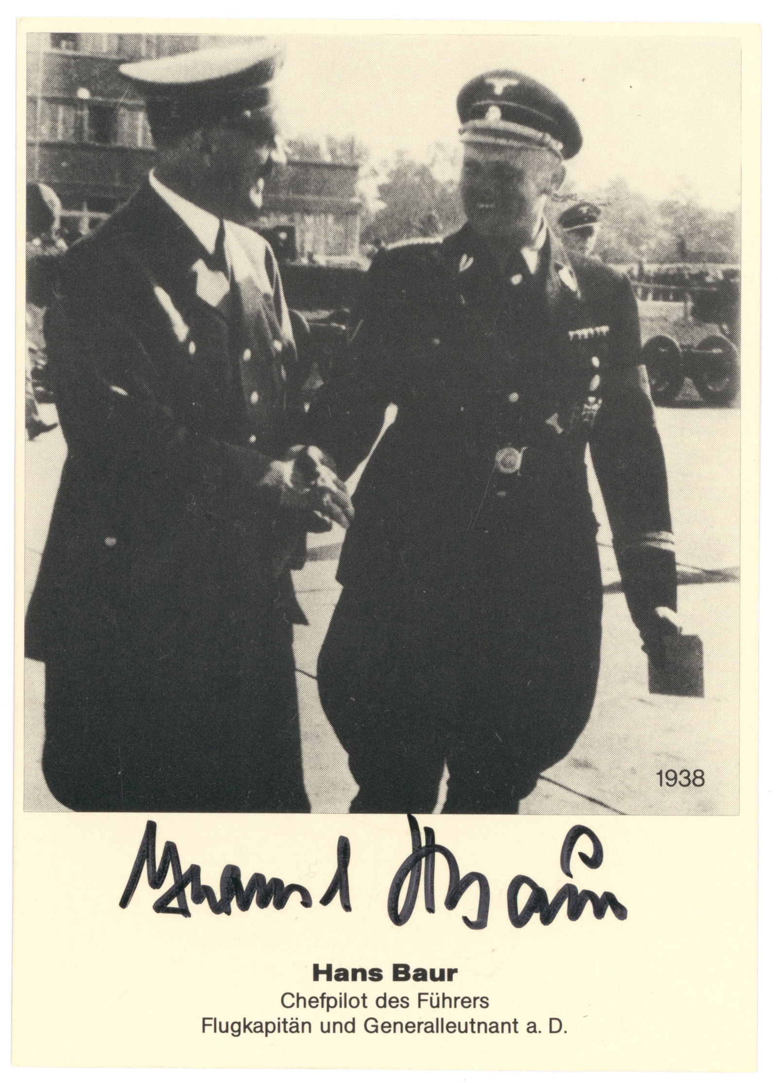 HANS BAUER: (1897 - 1993) German Luftwaffe pilot, tasked by the Luftwaffe to serve as Adolf Hitler's personal pilot. S.P., 4 x 6 in. b/w, shows him in uniform shaking hands with Adolf Hitler, signing at bottom