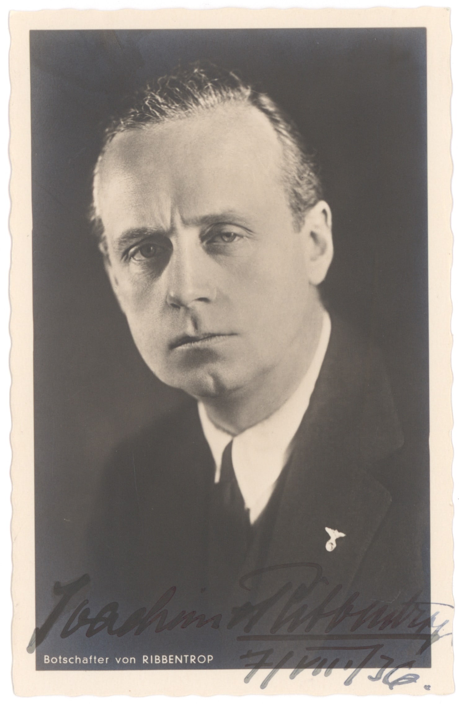 JOACHIM VON RIBBENTROP: 1893 - 1946) Nazi foreign minister. First of the Nuremberg defendants to hang on October 16, 1946. Fine S.P., 3.5 x 5.5 in. b/w, a Hoffmann real-photo postcard portrait in head and shoulders, boldly s