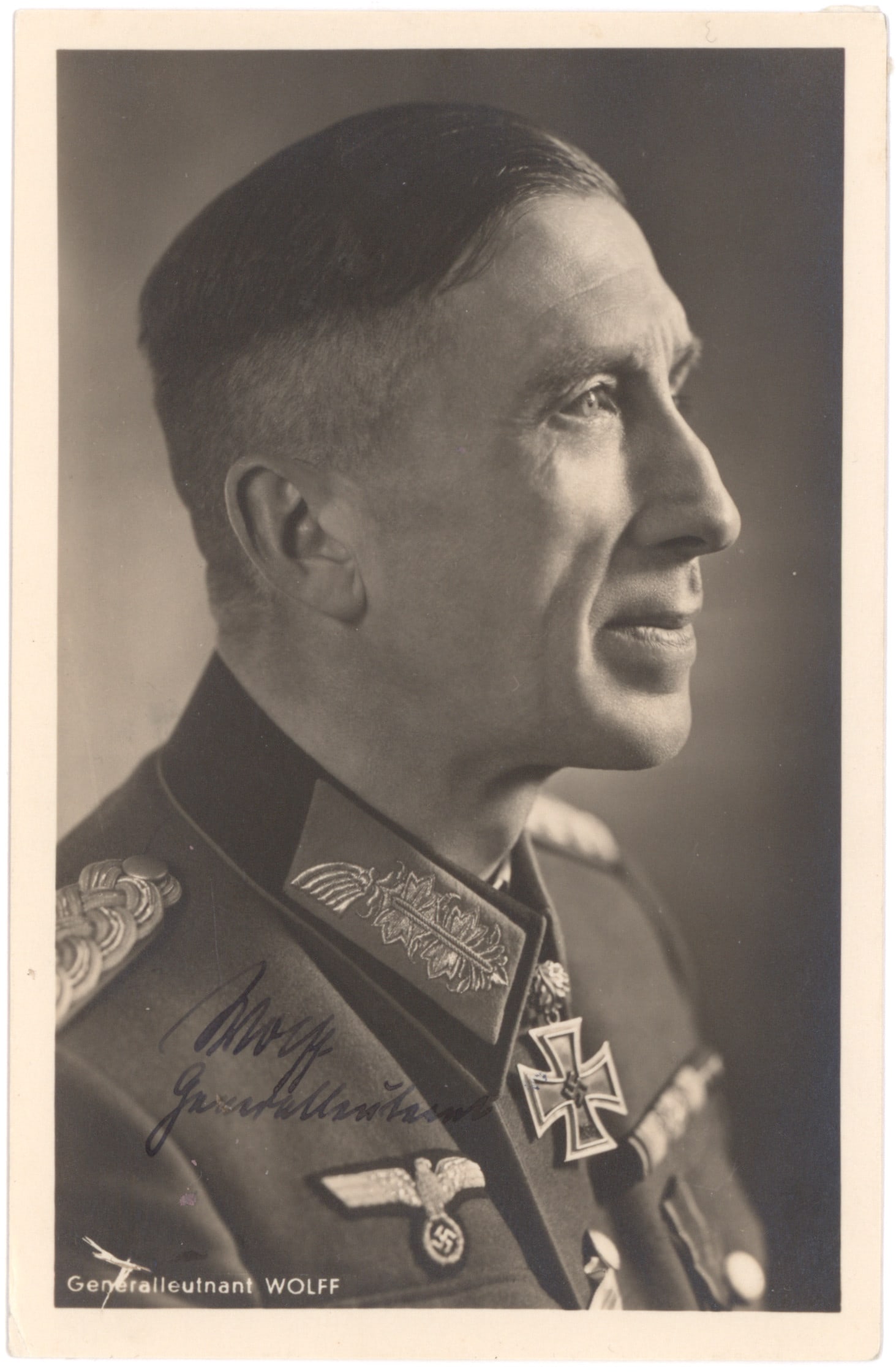 LUDWIG WOLFF: (1893 - 1968) German general who commanded the XXXIII Army Corps and a recipient of the Knight's Cross with Oak Leaves. War-date S.P., 3.5 x 5.5 in. b/w, a chest, up Hoffmann portrait showing Wolff in