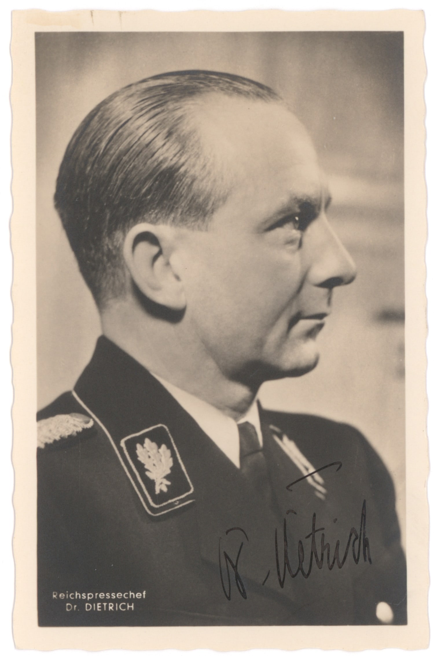 OTTO DIETRICH: (1897 - 1952) NSDAP Press Chief and State Secretary in the Ministry of Propaganda, later sentenced for war crimes. S.P., 3.5 x 5.5 in. b/w, a Hoffmann photo postcard showing Dietrich in uniform, signe