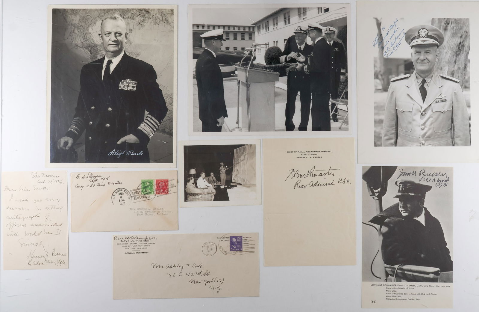 UNITED STATES NAVY (7): A good lot of seven items signed by prominent Navy commanders, in various formats (noted). Includes: ARLEIGH BURKE (S.P. 8 x 10 in. b/w, an official U.S. Navy portrait signed in white ink at bottom);