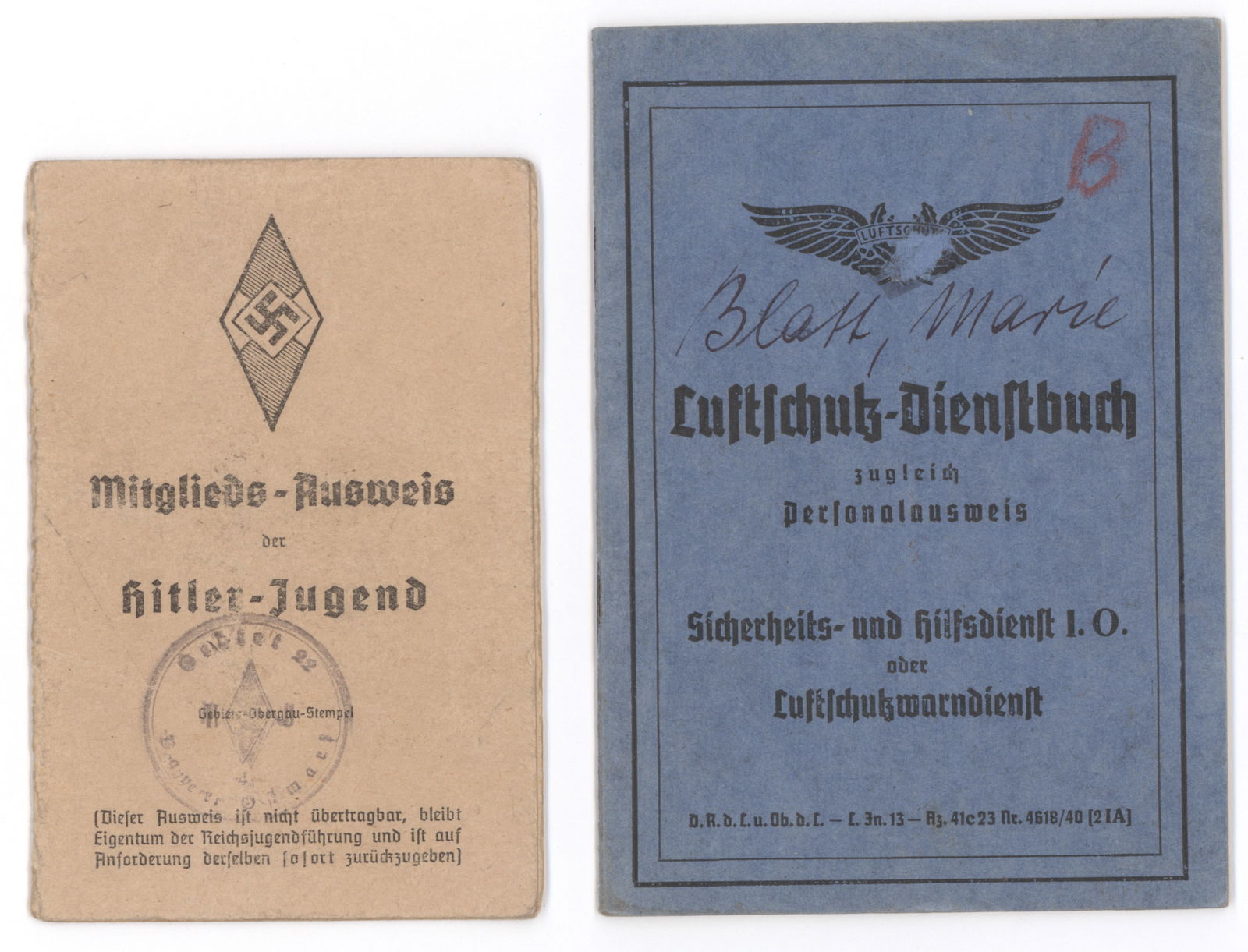 HITLER YOUTH AUSWEIS AND AIR-RAID DUTY SERVICE BOOK: A work service identity card, June 1, 1940, with the 14-year-old member’s portrait on inner cover and personal information on the adjacent page. WITH: an ‘Air-Raid Protection Service