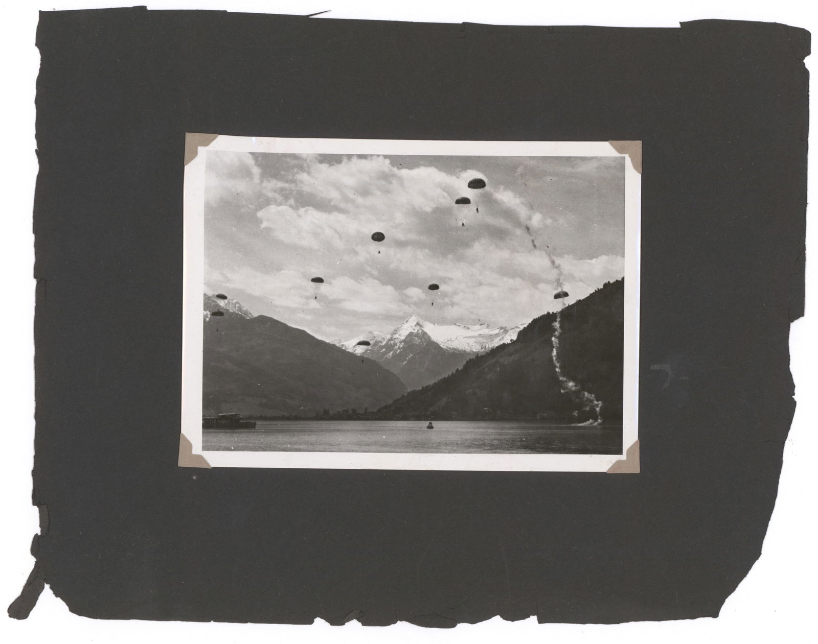 ('BAND OF BROTHERS' 506TH P.I.R.) LT. ROBERT E. HALEY'S 'LAKE JUMP' AND AUSTRIA R&R PHOTOGRAPHS (14): Good grouping of 14 original photographs from the personal photo album of Capt. ROBERT E. HALEY, Co. E, 506th P.I.R., taken by Haley and others as the the company was on leave in Austria after war's e