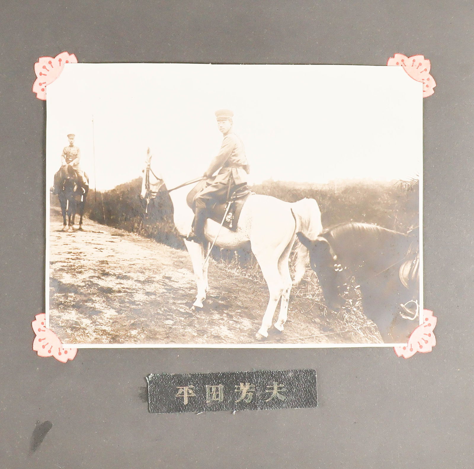 JAPANSE AIR FORCE '7TH SQUADRON' PHOTOGRAPH ALBUM: containing approx. (68) b/w photographs 4 in. x 6 in., depicting many views of exteriors and interiors of the unknown base described simply as 'Squadron 7' as well a large variety of of activities