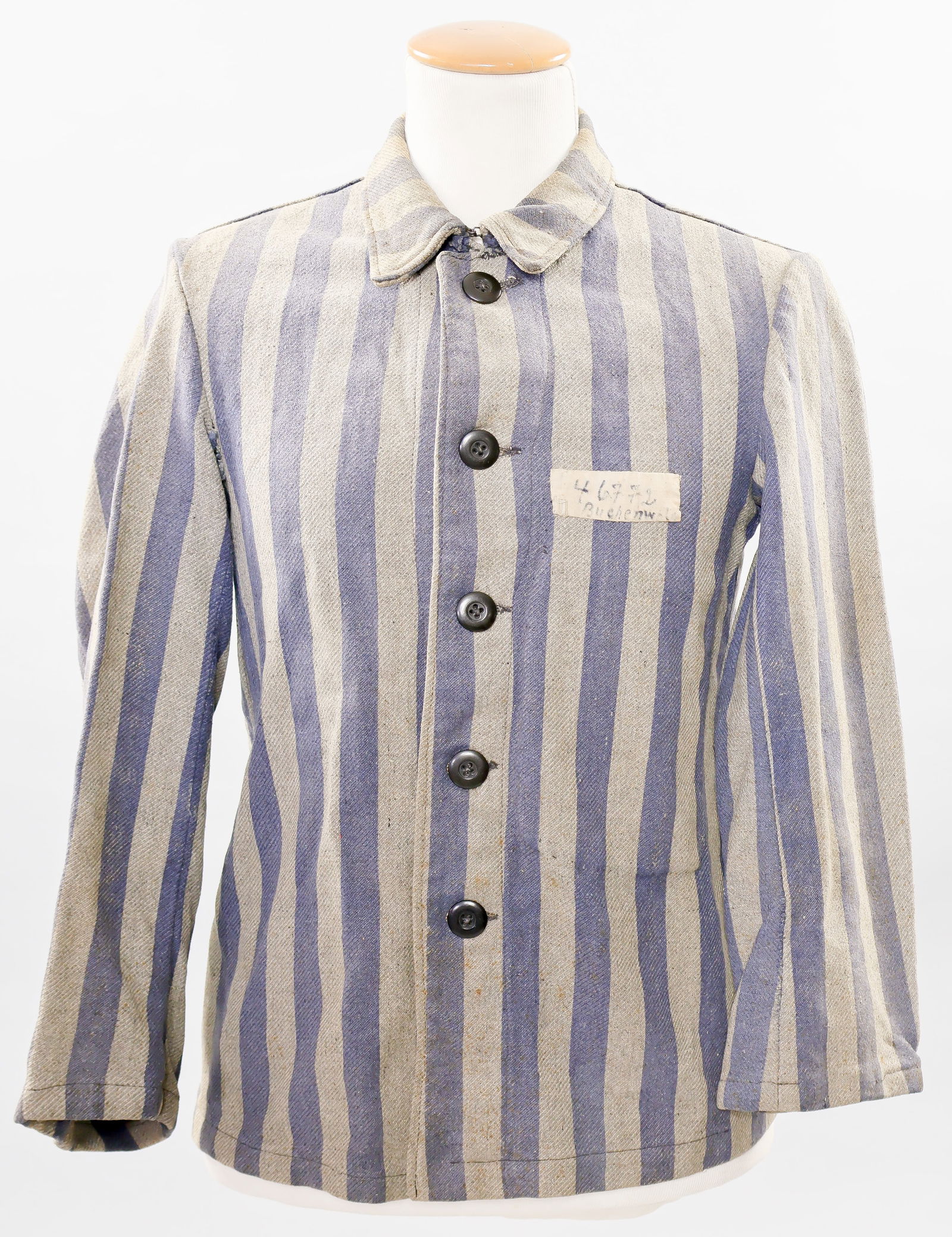 BUCHENWALD CAMP PRISONER'S JACKET, IDENTIFIED: An especially rare, genuine Buchenwald KZ-lager prisoner's jacket, once the property of Lothar Reigmann, born Mar. 27, 1917, Buchenwald inmate No. 46772 and coded 'BV' or 'Berufsverbrecher', or