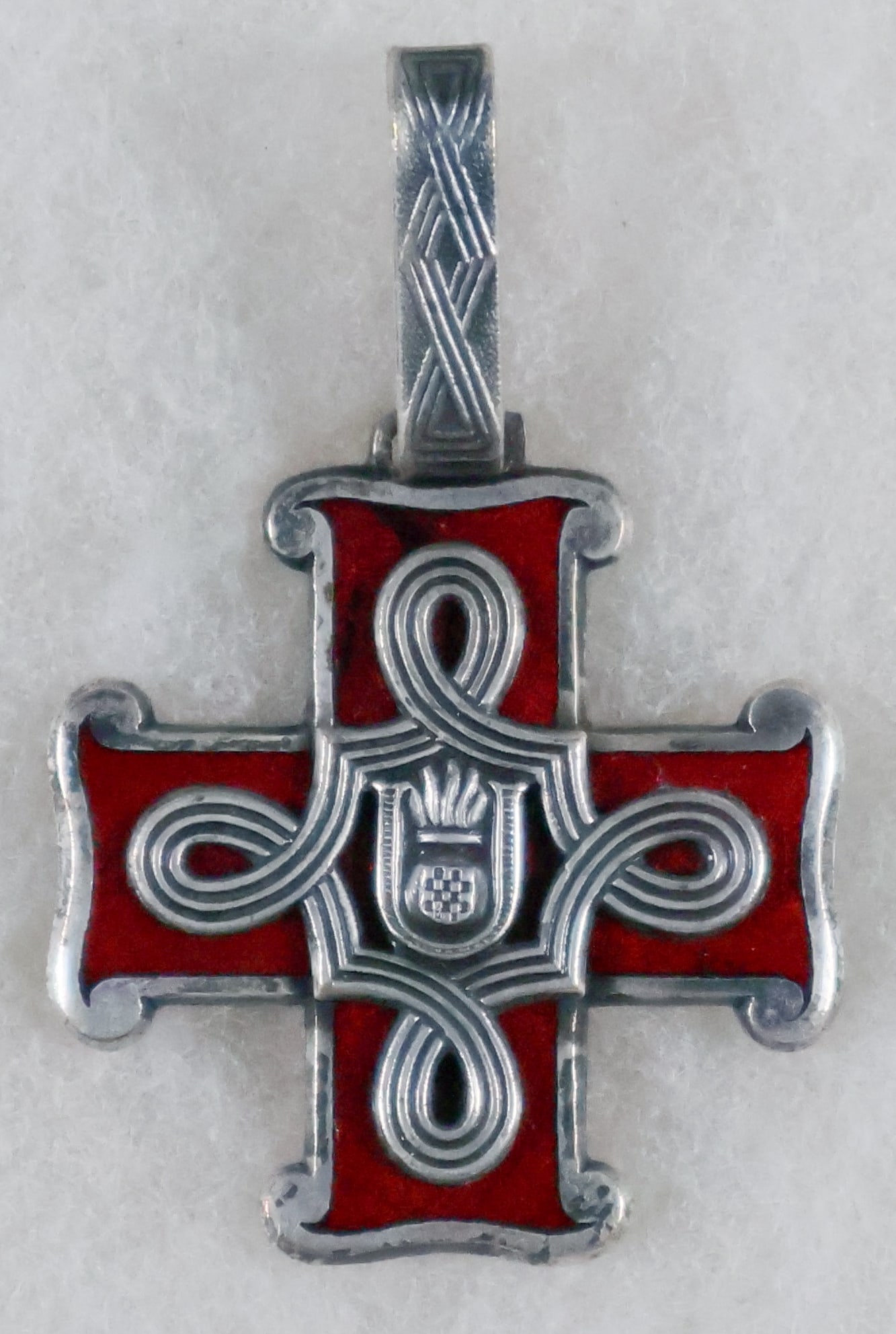 (CROATIA) ORDER OF MERIT, 2ND CLASS: Croatian Order of Merit Cross, 2nd Class Christian Version, two-piece construction, silver with red enamels, marked '10.IV / ZA ZASLUGE / 1942' on the reverse, 44.5 mm wide. Very good.