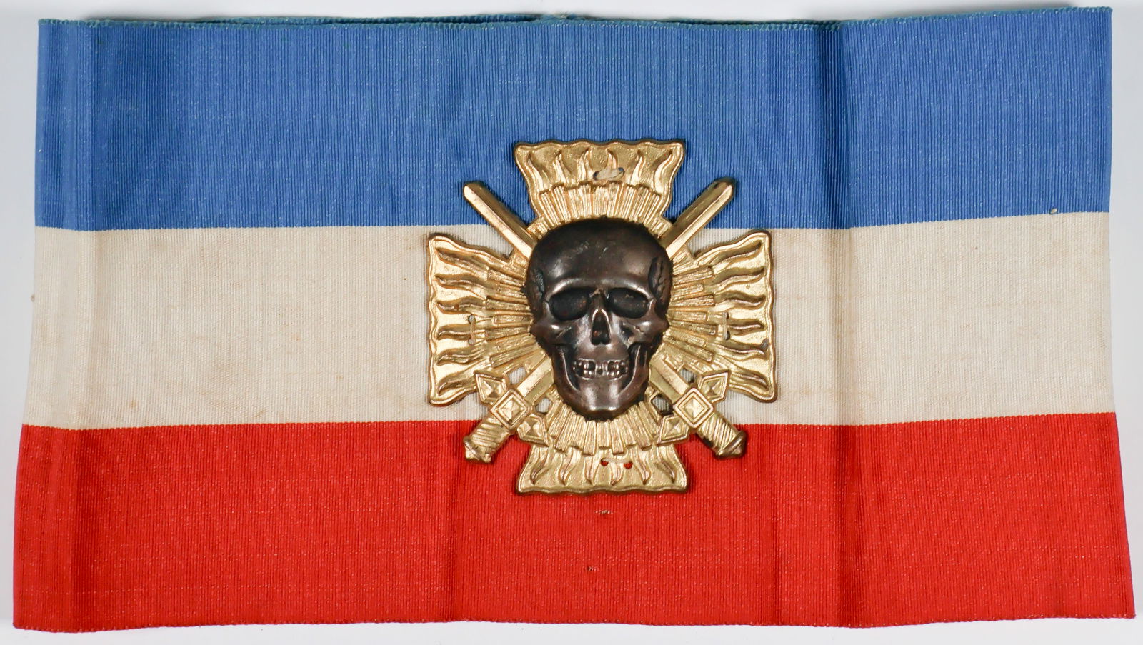 CROIX DE FEU ARMBAND: An interesting military relic of the interwar right-wing league, Croix-de-Feu, which was founded by General Francois de la Rocque and existed from 1930-1936. This armband measures 13.75 x 3.5 in., com