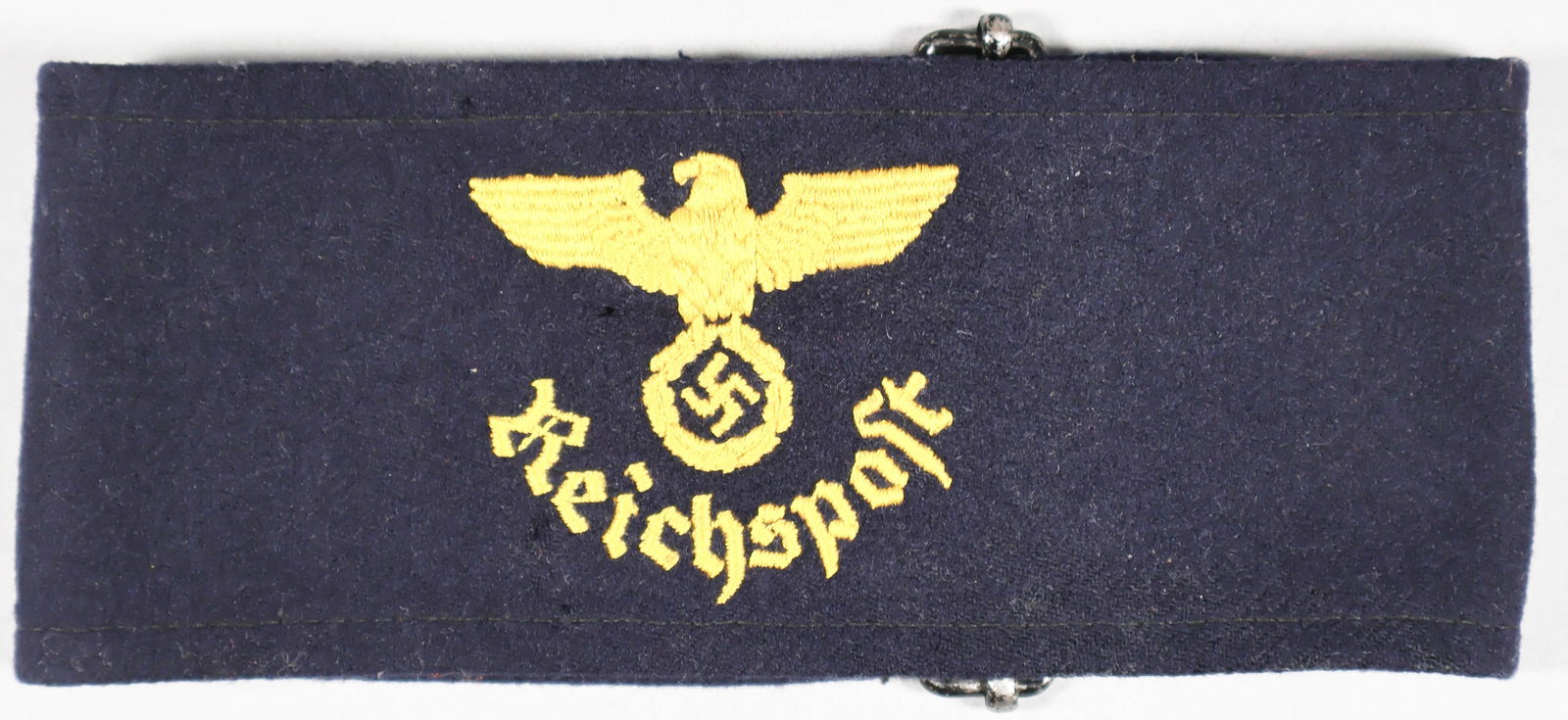 GERMAN REICHSPOST OFFICIAL'S ARM BAND: German Reichspost Official's armband, heavily embroidered wool construction, 16 x 3 in., with metal tightening buckle at one end. Some mothing about the emblem, else very good.
