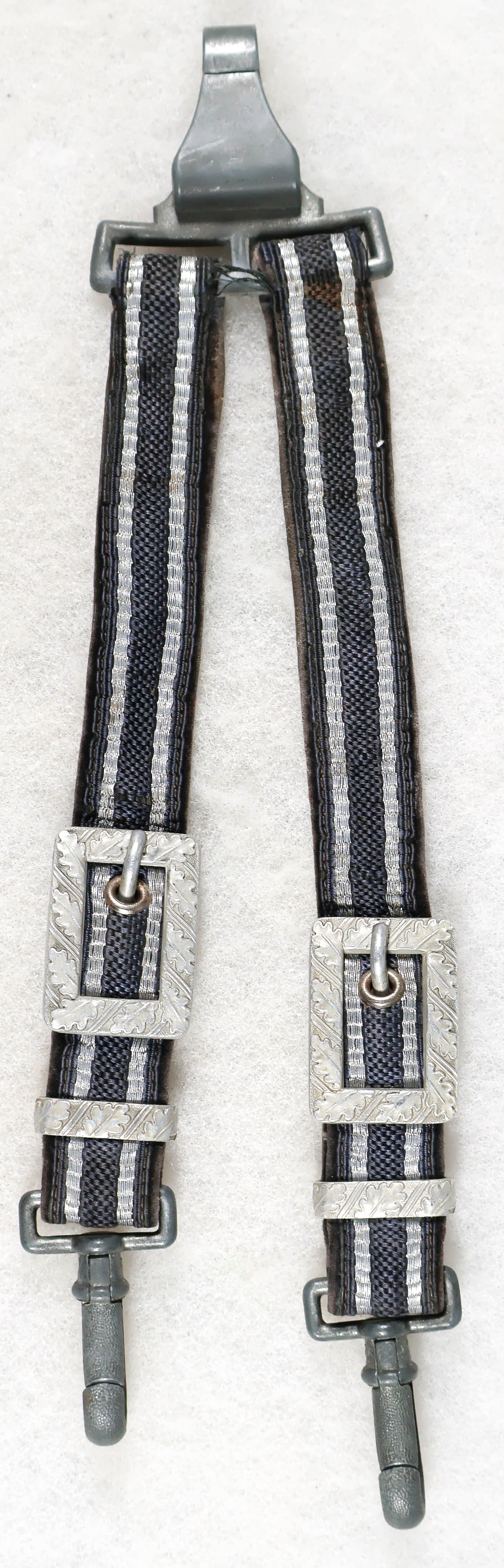 LUFTWAFFE DAGGER HANGERS: Pair of Luftwaffe dagger hangers marked 'D.R.G.M.', in very good condition.